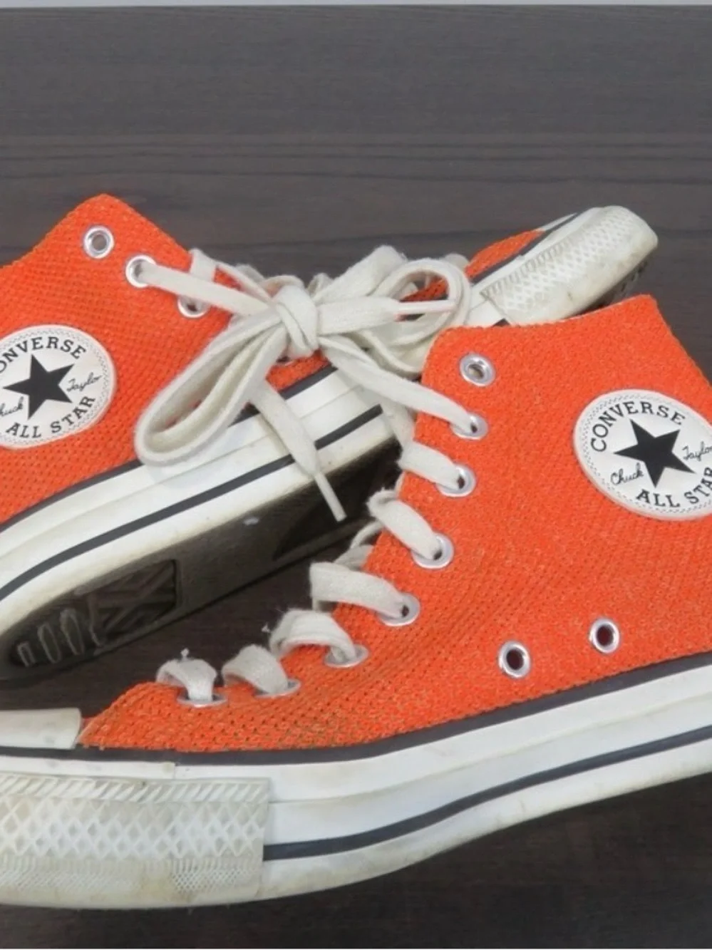 Converse women’s 8.5 Orange High Top Chuck Taylors